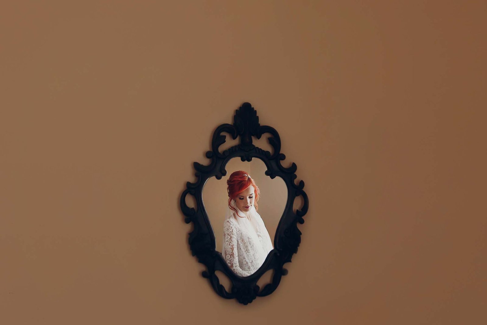 stylish-happy-bride-hand-on-luxury-wedding-dress-H8QJERP.jpg